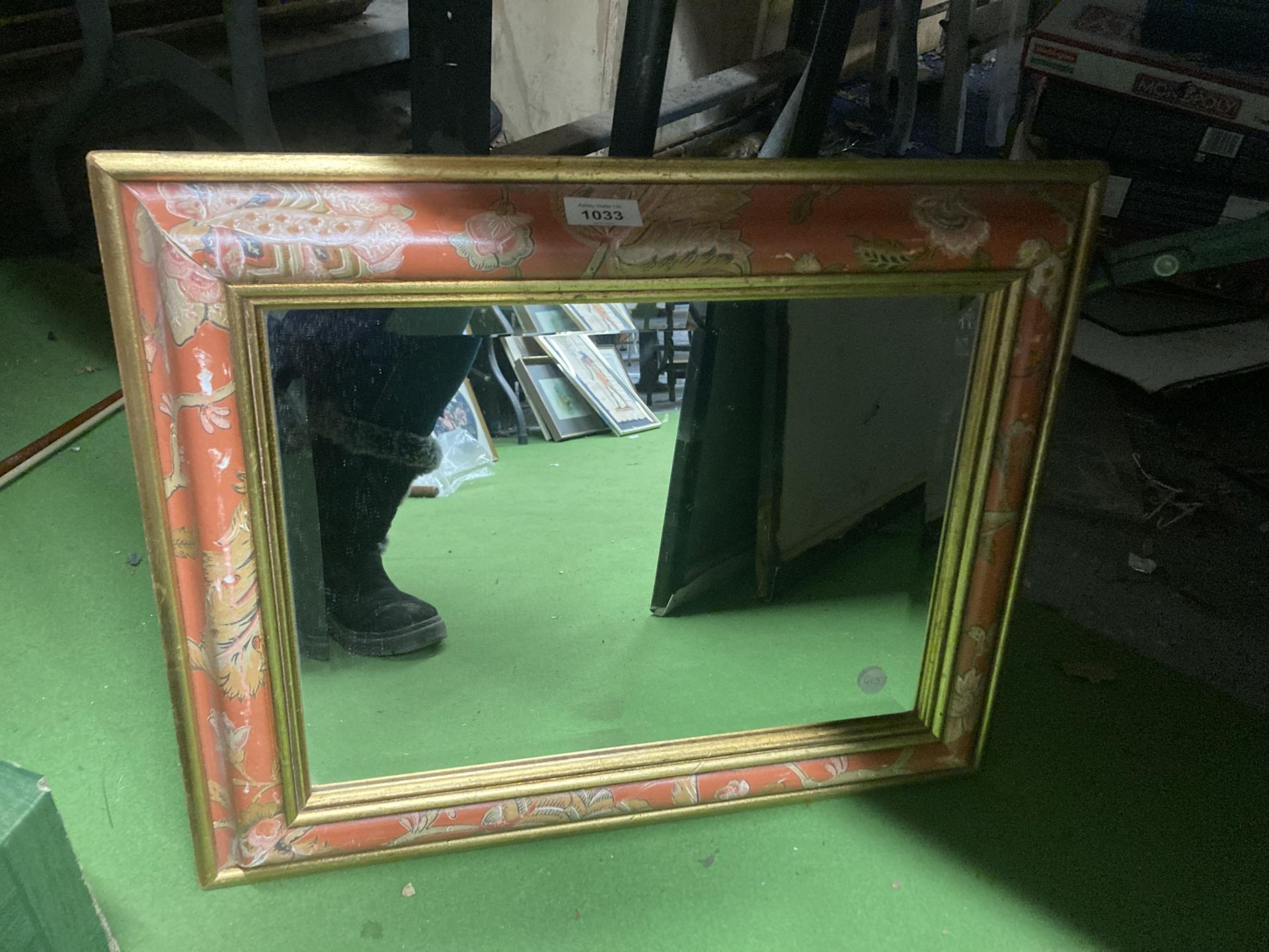 A BEVELLED EDGE MIRROR WITH FLORAL FRAME, 53CM X 43CM