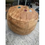 AN EGYPTIAN STYLE LEATHER POUFFE