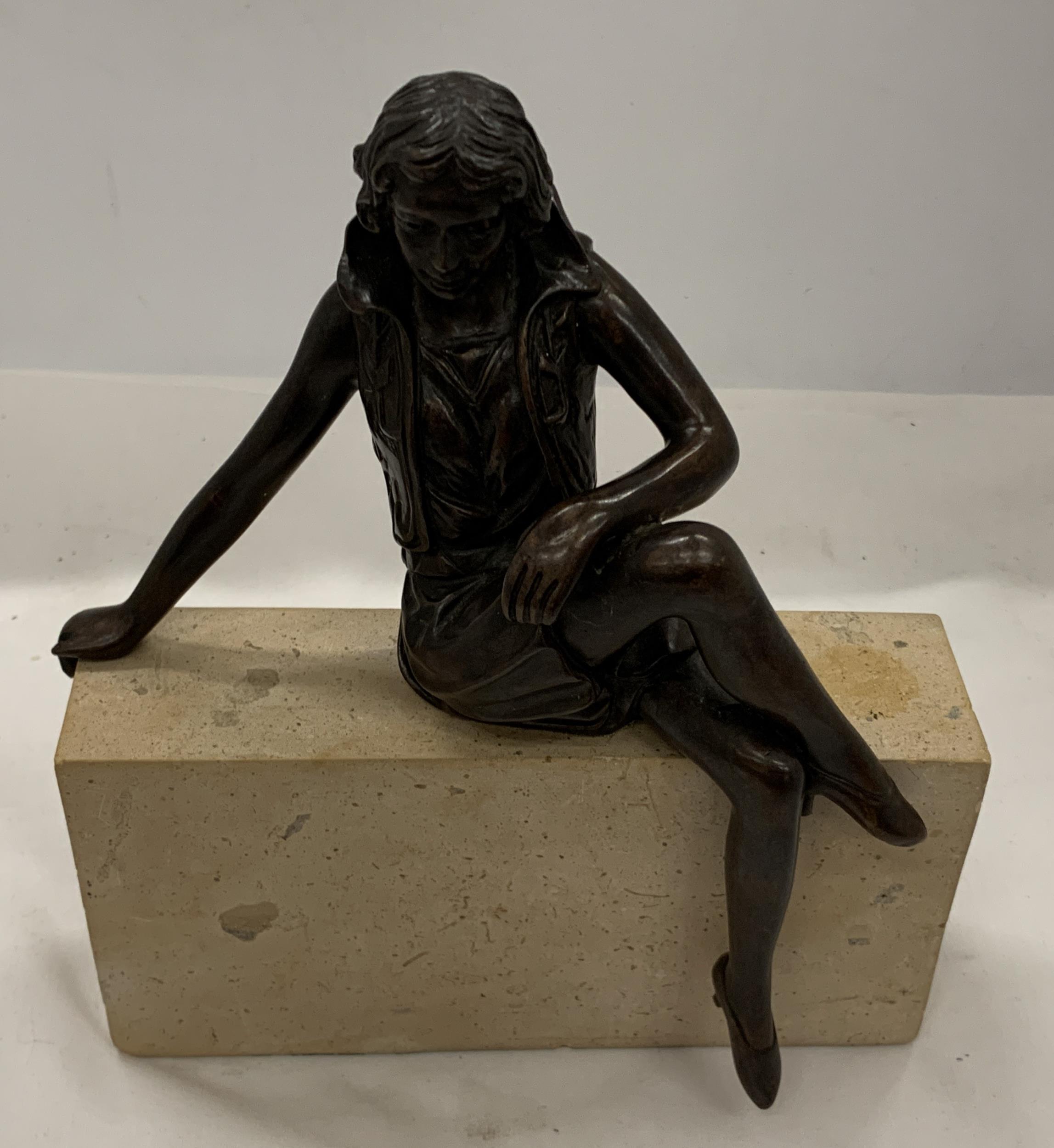 AN ART DECO STYLE BRONZE MODEL OF A GIRL ON STONE BASE, INDISTINCTLY SIGNED