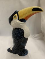 A DRAGONFLY JACK GRAHAM DESIGN TOUCAN FIGURE