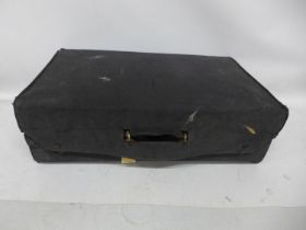 A WORLD WAR II PERIOD FRENCH LEATHER SUITCASE WITH OUTER COVER, SIMILAR TO ONES USED BY THE FRENCH