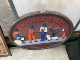 A FRAMED 'CHICAGO BLUES' WALL PLAQUE