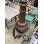 A CAST IRON GARDEN CHIMENEA ( STAND AND BASE A/F)