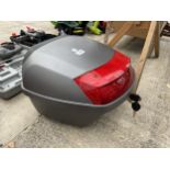 A MOTORBIKE STORAGE BOX WITH KEY