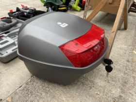 A MOTORBIKE STORAGE BOX WITH KEY