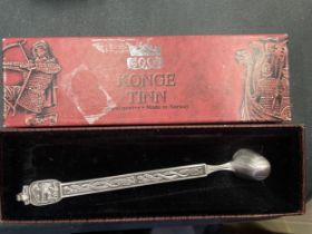 A NORWEGISN KONGE TINN CANDLE SNUFFER, BOXED