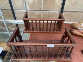 A PAIR OF DECORATIVE MAHOGANY BOOK STANDS