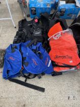 AN ASSORTMENT OF DIVING EQUIPMENT TO INCLUDE LIFE JACKETS AND BACK PACKS ETC
