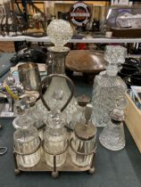 A QUANTITY OF GLASSWARE TO INCLUDE A SHIPS DECANTER, A BOTTLE CRUET SET ON A STAND, WHISKY DECANTER,