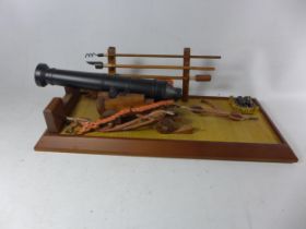 A MODEL OF A NAPOLEONIC WAR NAVAL CANON, LENGTH 40CM