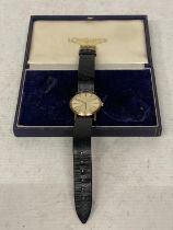A VINTAGE LONGINES GENTLEMAN'S WRIST WATCH WITH 9 CARAT GOLD CASE, GOLD DIAL AND ORIGINAL CASE