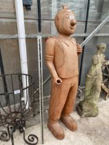 A HARDWOOD CARVED FIGURE OF TINTIN (H:126CM)