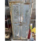 A METAL 1930's AIR MINISTRY TWO DOOR STORAGE CABINET