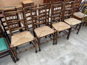 A SET OF FOUR LANCASHIRE STYLE SPINDLE BACK DINING CHAIRS, WITH RUSH SEATS