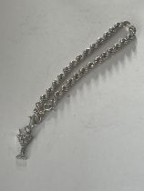 A SILVER ROPE BRACELET AND CHARM