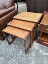 A RETRO TEAK NEST OF THREE G-PLAN TABLES