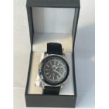AN AS NEW AND BOXED SOLAR TIME WRIST WATCH CATALOGUED AS WORKING BUT NO WARRANTY GIVEN