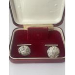 A BOXED PAIR OF SILVER DESIGNER CUFFLINKS