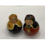 TWO RINGING 'RUSSIAN DOLLS' ON WOBBLY BASES