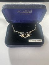 A BOXED SILVER TULIP NECKLACE