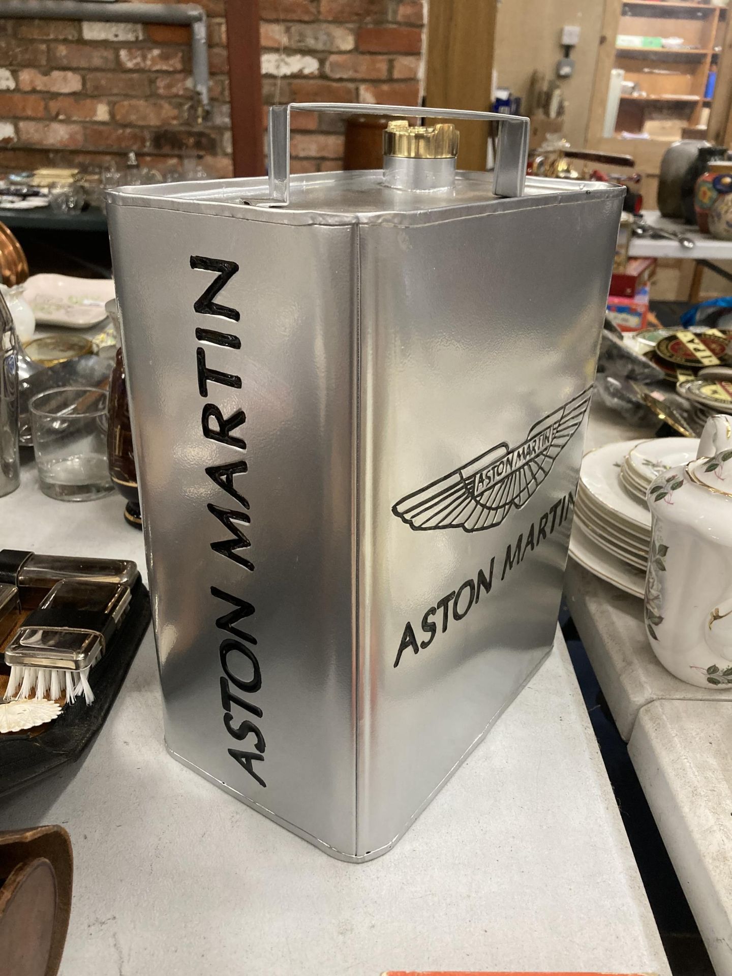 A SILVER METAL ASTON MARTIN PETROL CAN WITH BRASS TOP - Image 2 of 3