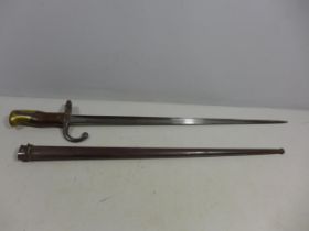 A FRENCH GRAS BAYONET AND SCABBARD DATED 1880, 52CM BLADE, LENGTH 66CM