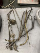 A MIXED GROUP OF VINTAGE IMPLEMENTS