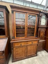 A VICTORIAN MAHOGANY SECRETAIRE TWO DOOR BOOKCASE, 49" WIDE, WITH A CUPBOARD TO THE BASE