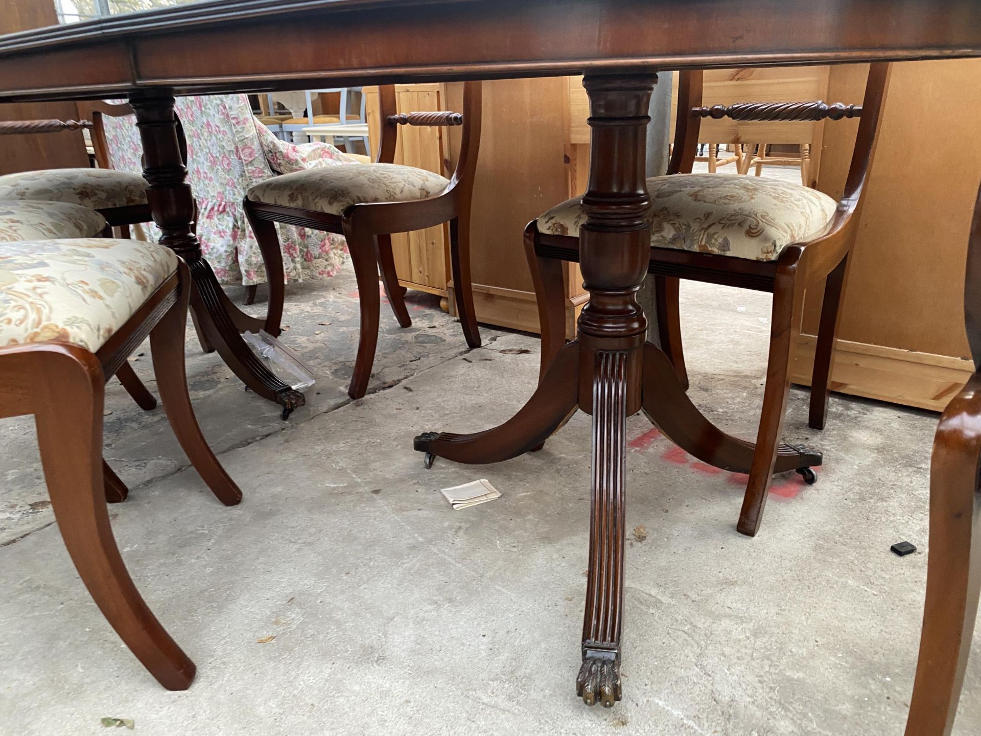 A MAHOGANY REGENCY STYLE TWIN PEDESTAL EXTENDING DINING TABLE, 64 X 39" (LEAF 20") AND SIX ROPE BACK - Image 5 of 7