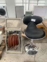 TWO ITEMS TO INCLUDE A HOSE AND REEL AND A BREAKFAST BAR STOOL