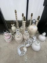 A LARGE ASSORTMENT OF CERAMIC AND WOODEN TABLE LAMPS