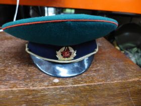 A RUSSIAN GREEN DRESS, CAP AND BADGE, SIZE 60