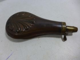 A COPPER AND BRASS POWDER FLASK, LENGTH 19CM