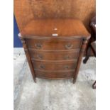A MAHOGANY BOW FRONTED CHEST OF FOUR GRADUATED DRAWERS, 22" WIDE