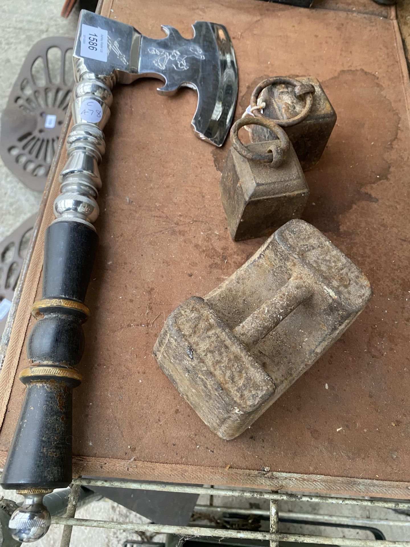 THREE VINTAGE CAST IRON WEIGHTS AND A BILLET CHROME ORNAMETAL AXE - Image 2 of 4