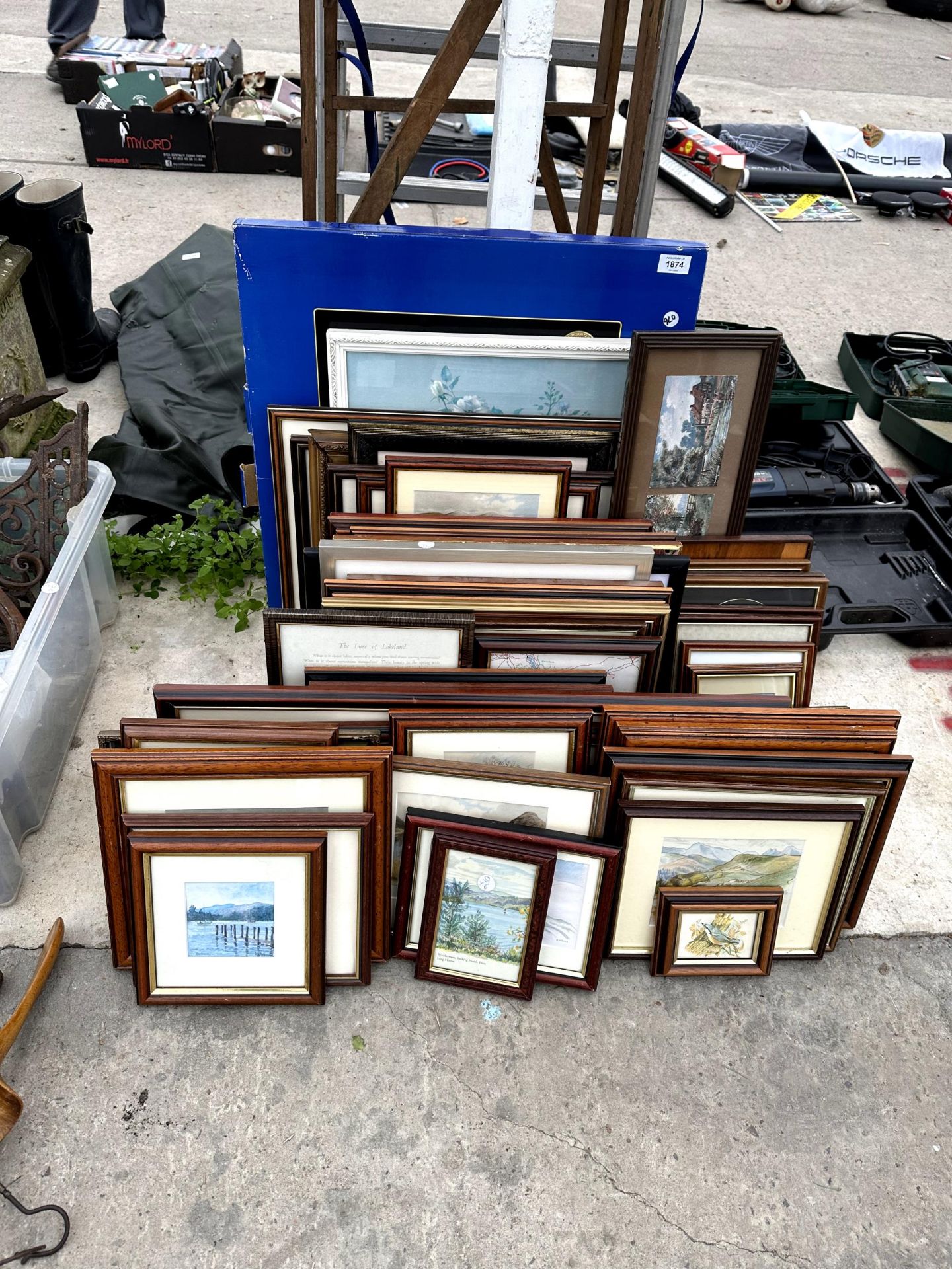 A LARGE ASSORTMENT OF FRAMED PRINTS AND PICTURES