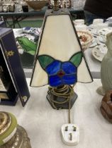 A TABLE LAMP WITH TIFFANY STYLE LEADED GLASS SHADE