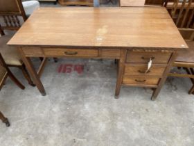 A MID 20TH CENTURY OAK SINGLE PEDESTAL WRITING DESK WITH IMPRESSED MARK 'CADBURY 1930', 54 X 27",