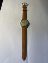 A VINTAGE AVIA OLYMPIC 15 JEWELS INCABLOC SHOCK PROTECTED WRIST WATCH WITH NEW TAN LEATHER STRAP