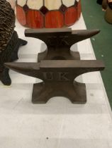 A PAIR OF CAST ANVIL BOOK-ENDS