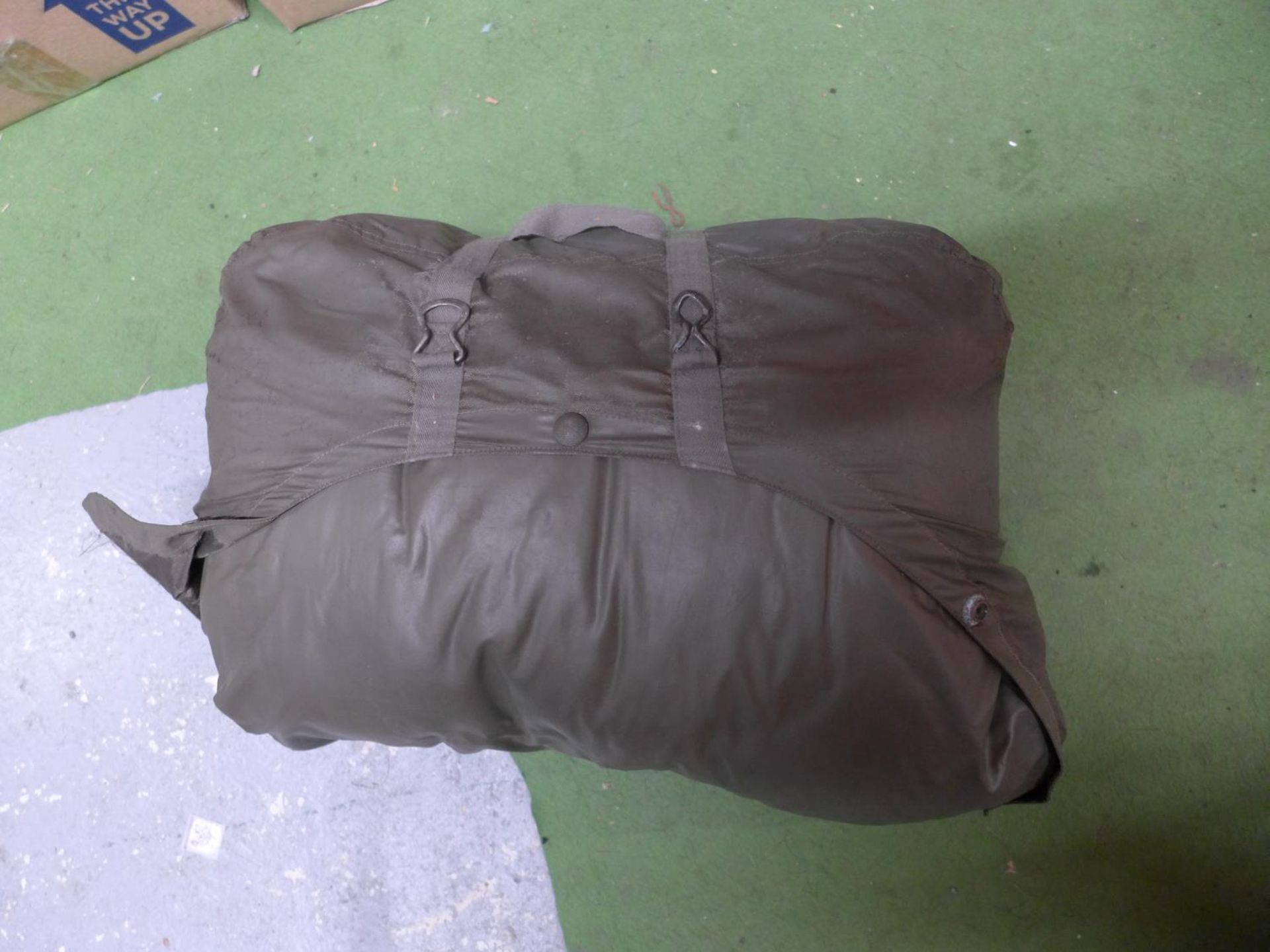 A GERMAN GREEN SNIPER SLEEPING BAG WITH ARMS