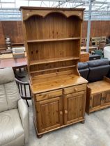 A MODERN VICTORIA (DUCAL) PINE DRESSER COMPLETE WITH RACK, 35" WIDE