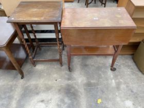 AN OAK BARLEY TWIST CENTRE TABLE AND DROP LEAF TROLLEY