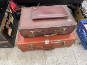 TWO VINTAGE TRAVEL CASES AND A LEATHER FOLDER