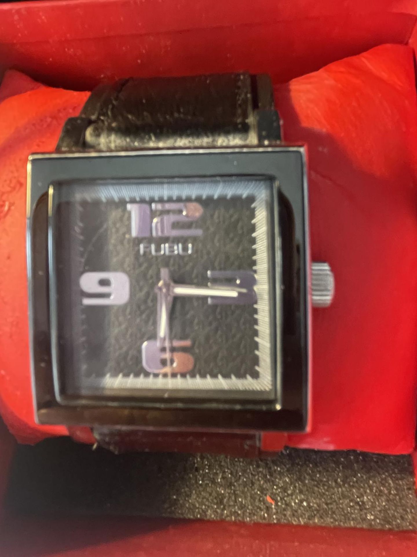 AN AS NEW AND BOXED FUBU WRISTWATCH SEEN WORKING BUT NO WARRANTY - Image 2 of 4