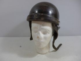 A MILITARY TANKERS HELMET AND LINER, THE INSIDE MARKED PRODUCTION STAR HOLLYWOOD DEPOSE FRANCE