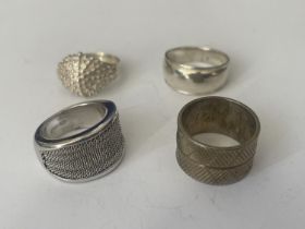 FOUR ASSORTED SILVER RINGS