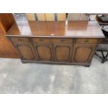 A REPRODUCTION MAHOGANY SIDEBOARD ENCLOSING FOUR DOORS AND THREE DRAWERS, 60" WIDE