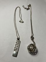 TWO SILVER NECKLACES WITH PENDANTS