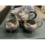 A VINTAGE PEWTER TEASET TO INCLUDE A TEAPOT, CREAM JUG AND SUGAR BOWL